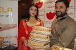 MANNARA CHOPRA IN SIZZLING RED LAUNCHES VADDANAM & UNCUT DIAMOND MELA AT MANEPALLY JEWELLERS (27)_56690cd587738.jpg