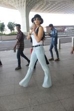 Urvashi Rautela snapped at airport on 17th March 2016 (89)_56ebeb189cd35.JPG