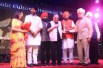 Dabur Group Chairman Emeritus Vivek Chand Burman receiving Punjabi Icon Award organised by Punjabi Cultural Heritage Board President Charan Singh Sapra_570b723ef1f69.jpg