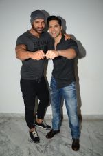 John Abraham, Varun Dhawan promote Dishoom on Fever 104 FM on 18th July 2016 (5)_578d9c24cf801.jpg