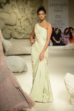 Model walks the ramp during showcase of Gaurav Gupta collection scape song at FDCI India Couture Week 2016 on 23 July 2016 (11)_57943b33c2e11.JPG