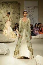 Model walks the ramp during showcase of Gaurav Gupta collection scape song at FDCI India Couture Week 2016 on 23 July 2016 (15)_57943b38a3dde.JPG