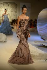 Model walks the ramp during showcase of Gaurav Gupta collection scape song at FDCI India Couture Week 2016 on 23 July 2016 (75)_57943b7340e41.JPG