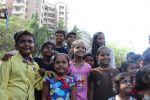  Poonam Pandey Distribute Raincoat To Neddy Kids on 30th May 2017 (22)_592ebeffbadf9.JPG