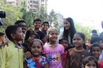  Poonam Pandey Distribute Raincoat To Neddy Kids on 30th May 2017 (28)_592ebf09bb41c.JPG