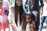  Poonam Pandey Distribute Raincoat To Neddy Kids on 30th May 2017 (43)_592ebf239bdb6.JPG