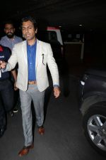 Nawazuddin Siddiqui at the airport on 10th June 2017 (1)_593bc12e029dc.jpeg