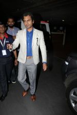 Nawazuddin Siddiqui at the airport on 10th June 2017 (5)_593bc13002a97.jpeg