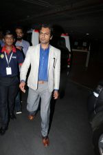 Nawazuddin Siddiqui at the airport on 10th June 2017 (6)_593bc130925ac.jpeg