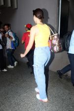 Ananya Panday in a Yellow tank top and blue jeans on 23rd May 2023 (3)_646e18e276dd3.jpg