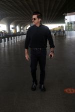 Anil Kapoor dressed in black with shades at the airport on 19th May 2023 (14)_646da9809b39a.jpg