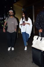 Anushka Sharma and Virat Kohli at Airport on 22nd May 2023 (8)_646dea030c6e4.jpg