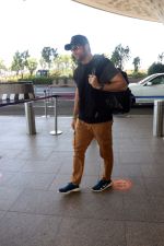 Fardeen Khan wearing sunglasses, black shirt, khaki pants, blue nike shoes and black Nike hat (4)_646f347a48a9c.jpg