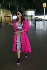 Khushali Kumar wearing a stylish pink coat and sunglasses in a pair of purple high top sneakers (14)_646f31bcd8f4f.jpg