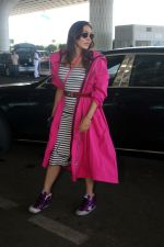 Khushali Kumar wearing a stylish pink coat and sunglasses in a pair of purple high top sneakers (16)_646f31de889d5.jpg