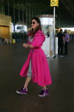 Khushali Kumar wearing a stylish pink coat and sunglasses in a pair of purple high top sneakers (7)_646f31cac0801.jpg
