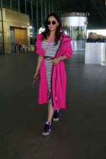 Khushali Kumar wearing a stylish pink coat and sunglasses in a pair of purple high top sneakers (8)_646f31c7dc064.jpg