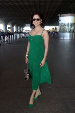 Nushrratt Bharuccha in shoulderless green dress with a tie knot wearing dark shades (12)_646f494926198.jpg