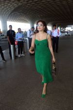 Nushrratt Bharuccha in shoulderless green dress with a tie knot wearing dark shades (15)_646f4950695f6.jpg