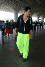 Krushna Abhishek in a black laced coat and fluorescent green pants and black sneakers (1)_64718d85aace2.jpg