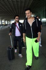 Krushna Abhishek in a black laced coat and fluorescent green pants and black sneakers (13)_64718daae265d.jpg