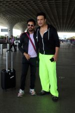Krushna Abhishek in a black laced coat and fluorescent green pants and black sneakers (4)_64718d8fc2d9b.jpg