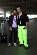Krushna Abhishek in a black laced coat and fluorescent green pants and black sneakers (6)_64718d964b3f5.jpg