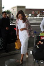 Shriya Saran in a white dress, pink coat design, holding Lady Dior Cannage two-way bag, Gucci Metallic Gold Textured Leather GG Marmont Fringe Detail Heel Pumps (4)_64718a80d6005.jpg