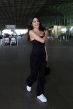 Nikki Tamboli wearing all black strapless bodycon dress, white sneakers holding Tamboli holding Chanel Black Quilted Lambskin Small Trendy Top Handle Flap Bag (10)_64746df83b530.jpg