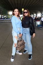 Sisters Sukriti Kakar and Prakriti Kakar dressed in blue holding Christian Dior Paris and Evalulu Leather Handbag wearing Jordon Nike Shoes (1)_647982aa14924.jpg