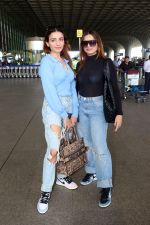Sisters Sukriti Kakar and Prakriti Kakar dressed in blue holding Christian Dior Paris and Evalulu Leather Handbag wearing Jordon Nike Shoes (1)_6479833994399.jpg