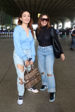 Sisters Sukriti Kakar and Prakriti Kakar dressed in blue holding Christian Dior Paris and Evalulu Leather Handbag wearing Jordon Nike Shoes (2)_647982b131f87.jpg