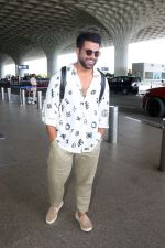 Rithvik Dhanjani wearing sunglasses white shirt khaki pant