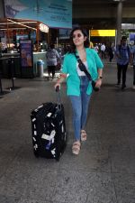 Shirley Setia dressed in blue jeans, camisole and teal shirt at the airport on 15 Jun 2023 (12)_648ae52419b53.jpg