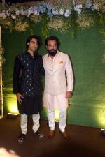 Bobby Deol with son Aryaman Deol pose for camera after the sangeet function on 16 Jun 2023 (3)_648d7297a31c7.jpeg
