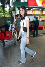 Manushi Chhillar seen at airport dressed in white top blue jeans and a celine cap on 17 Jun 2023 (12)_648d94c375d3d.JPG