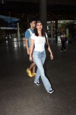 Manushi Chhillar seen at airport dressed in white top blue jeans and a celine cap on 17 Jun 2023 (2)_648d949f0330e.JPG