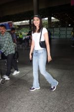 Manushi Chhillar seen at airport dressed in white top blue jeans and a celine cap on 17 Jun 2023 (5)_648d94aa4ffff.JPG