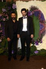 Sunny Deol and Rajveer Deol Pose for media at the reception of Karan Deol and Drisha Acharya on 18 Jun 2023 (6)_64906759b1fbb.jpeg