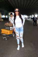 Poonam Pandey in white Cest La Vie Paris t-shirt and blue shredded jeans seen at the airport on 1 July 2023 (1)_64a0072fd7f53.JPG