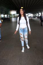 Poonam Pandey in white Cest La Vie Paris t-shirt and blue shredded jeans seen at the airport on 1 July 2023 (11)_64a007470ab92.JPG