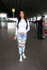 Poonam Pandey in white Cest La Vie Paris t-shirt and blue shredded jeans seen at the airport on 1 July 2023 (5)_64a0073a769e3.JPG