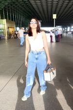 Sharvari Wagh dressed in white sleeveless top and blue jeans seen at the airport on 11 July 2023 (14)_64acda0781363.JPG