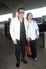 Govinda, Sunita Ahuja seen at the airport on 29 July 2023 (7)_64c4e2fac8d00.JPG
