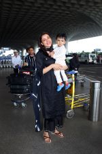 Kajal Aggarwal with her son Neil Kitchlu Spotted at the Airport Departure on 17th August 2023 (14)_64ddd29851761.JPG