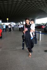 Kajal Aggarwal with her son Neil Kitchlu Spotted at the Airport Departure on 17th August 2023 (21)_64ddd2b259240.JPG