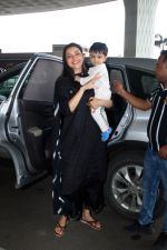 Kajal Aggarwal with her son Neil Kitchlu Spotted at the Airport Departure on 17th August 2023 (28)_64ddd266b31e7.JPG