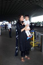 Kajal Aggarwal with her son Neil Kitchlu Spotted at the Airport Departure on 17th August 2023 (4)_64ddd275a2db4.JPG