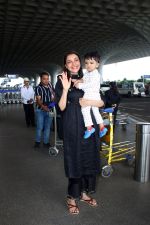 Kajal Aggarwal with her son Neil Kitchlu Spotted at the Airport Departure on 17th August 2023 (9)_64ddd285c25fe.JPG