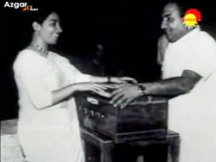 Mohd Rafi with a singer